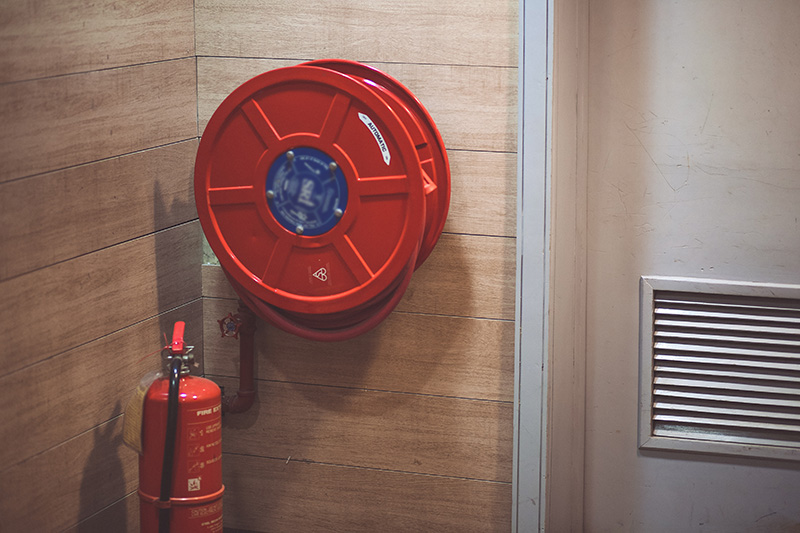 Fire extinguisher and reel